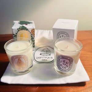 TWO Diptyque mini luxury candles and gift bag: Sapin and Feu de Bois.